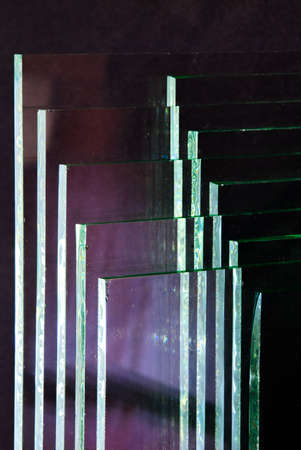 Sheets of Factory manufacturing tempered clear float glass panels cut to size.の写真素材