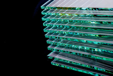 Sheets of Factory manufacturing tempered clear float glass panels cut to size.の写真素材