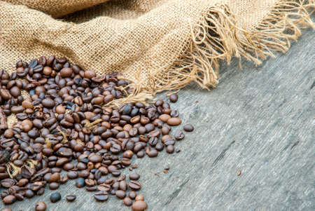 coffee beans on a rough sacking.の写真素材