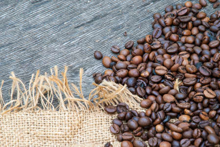coffee beans on a rough sacking.の写真素材