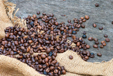 coffee beans on a rough sacking.の写真素材