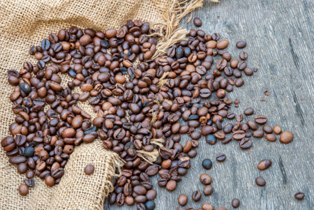coffee beans on a rough sacking.の写真素材