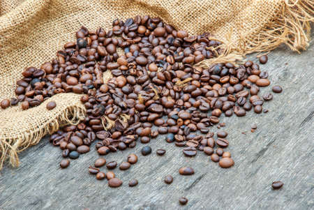 coffee beans on a rough sacking.の写真素材