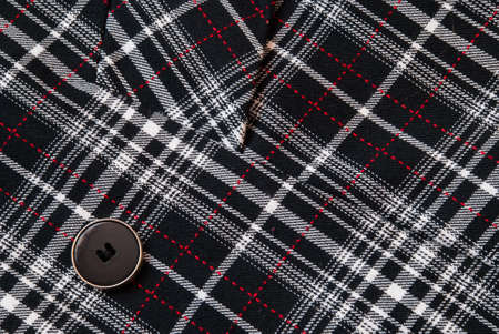 Button on the old clothesの写真素材
