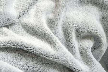 Close up white shaggy artificial fur texture or carpet for background.の写真素材