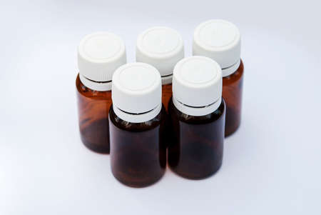 Medicine bottle isolated on white.の写真素材