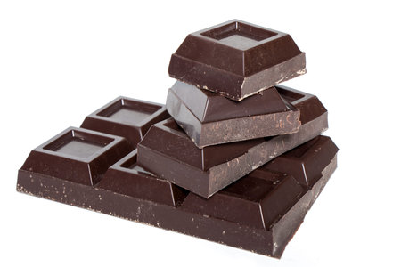 Pieces of Chocolate isolated on white background.