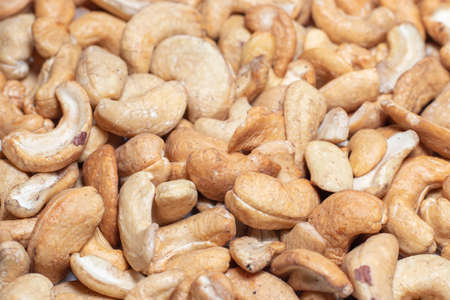 Roasted cashew nuts, texture and backgroundの写真素材