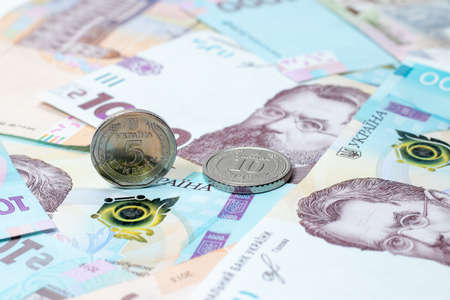 New banknotes and coins Ukrainian Hryvnia.の写真素材