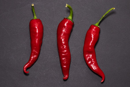Healthy food. Fresh vegetables. Peppers on a darck background