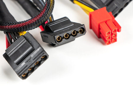 Computer power supply cables isolated on a white background.
