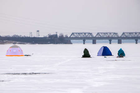 natural winter background, fisherman on iceの写真素材