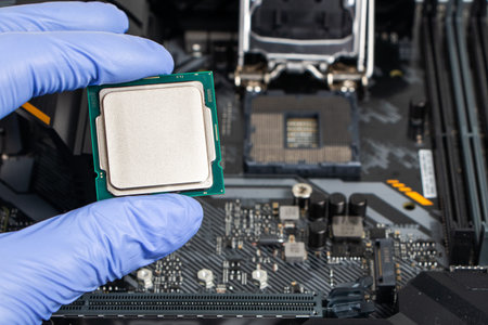 Plug in CPU microprocessor to motherboard socket. technological background. Concept computers...