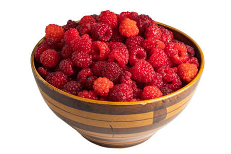 Fresh raspberry in a bowl on white.の写真素材