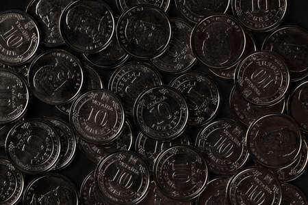 Ukrainian hryvnias coins. Background from Ukrainian coins 10 hryvnia. Money and financesの写真素材
