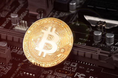 Gold Bitcoin electronic computer processor board.