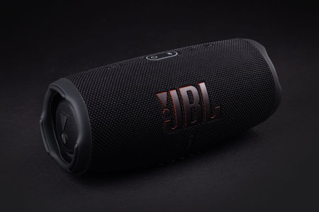 Dnioro Ukraine. 15 january 2022: A portable JBL Charge 5 sound system that can be connected via...