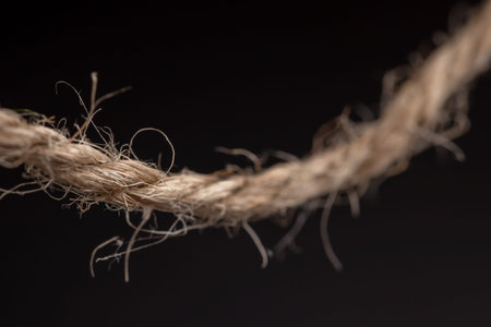 Coil rope on dark background.