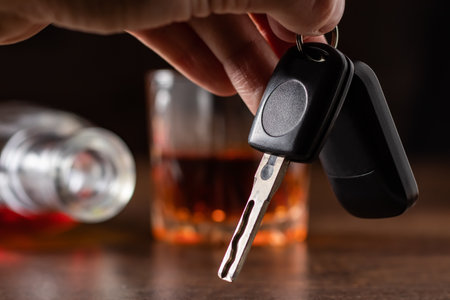 Do not drink and drive. Drunk man taking car keys.の写真素材