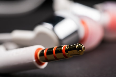 3.5 mm, mini jack, headphones cable on a white background closeup, macro.の写真素材