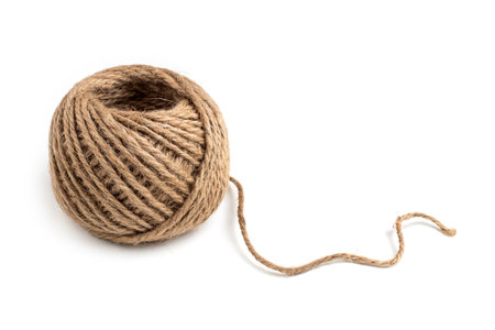 Coil of rope closeup on white background isolated.の写真素材