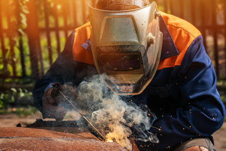 Welder erecting technical steel. Industrial steel welder in factory technical,の写真素材