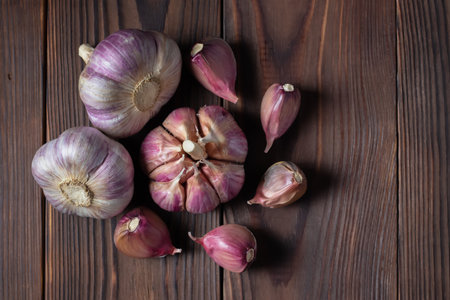 Garlic bulb on wooden background. close up.の写真素材
