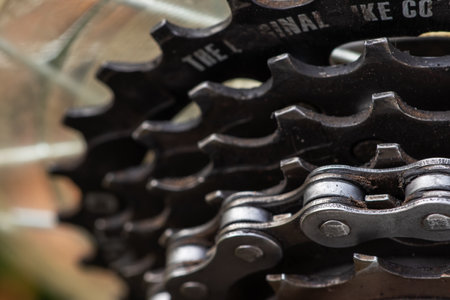 Dirty bicycle drivetrain. Gravel Bike Transmission in Mud. Dirty Chain Drive of Mountain Bike After Riding in Bad Weather. Concept of bike service after riding outdoors on a rainy day.の写真素材