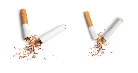 Broken cigarette isolated on white background - World No Tobacco Day.