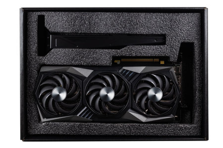 Video card in box for modern video games and cryptocurrency mining. The new video card with three...