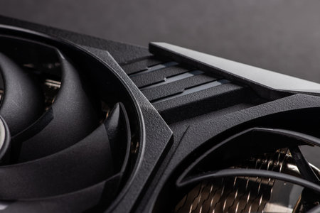 A close up of a modern GPU Graphic card on dark background