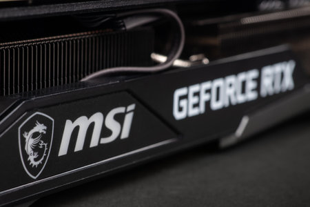 UKRAINE, DNIPRO, FEBRUARY 23, 2023: MSI Geforce RTX graphics card, Hardware components for build PC or mining rig.のeditorial素材