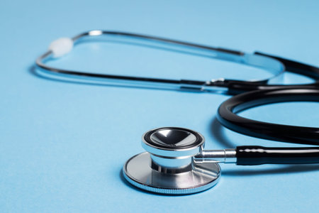 Black stethoscope for doctor diagnostic coronavirus disease, medical tool for health on blue...