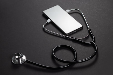 Mockup of the phone with the stethoscope checks the health. Online medical clinic communication with the patient. Telemedicine concept.. doctor online consultation concept.の写真素材