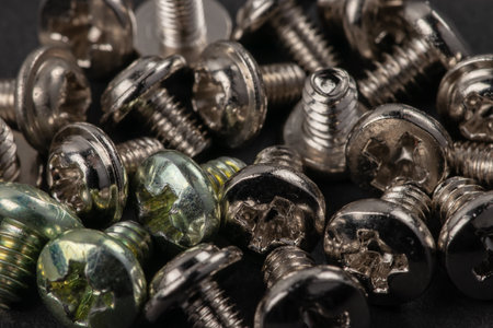 tapping screws made od steel, metal screw, iron screw, chrome screw, screws as a background, wood screwの写真素材