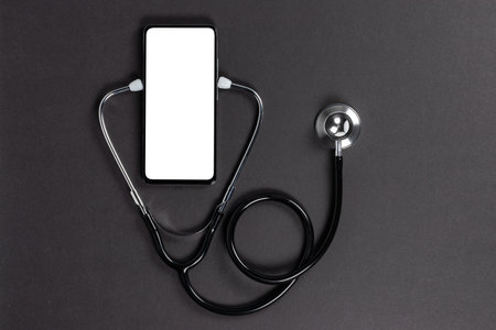 Mockup of the phone with the stethoscope checks the health. Online medical clinic communication with the patient. Telemedicine concept.. doctor online consultation concept.の写真素材