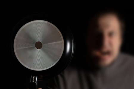 Photo of crazy angry mad outraged man holding kitchen pan.の写真素材