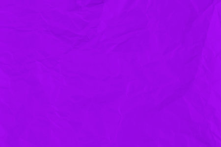 crumpled purple paper background texture close up copy space.