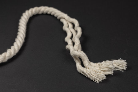 Rope detail on dark. Close-up of its rope texture Depth of field minimalism ropes.の写真素材
