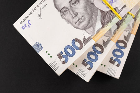 Stack of Ukrainian money hryvnia. grivna, hryvna with 500 banknotes.