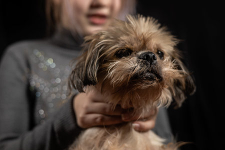 violence against animals. child strangling dog,