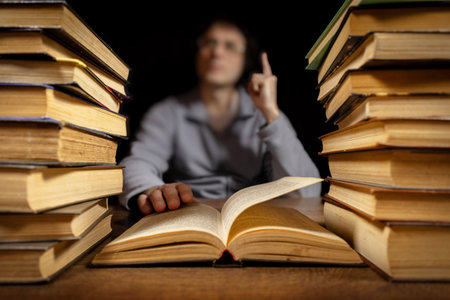 Idea concept. A man thinks after reading a book. Education, literature, knowledge, reading concept,の写真素材