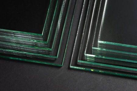 Glass factories produce glass used in buildings and homes. There are many different thicknesses and sizes.の写真素材