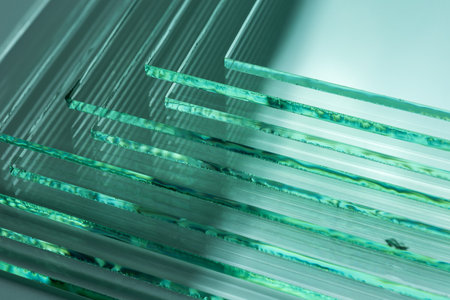 Sheets of Factory manufacturing tempered clear float glass panels cut to size.の写真素材
