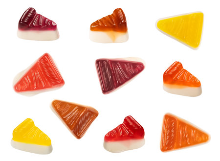 Set of delicious jelly candies in the shape of cheesecake on white background.の写真素材