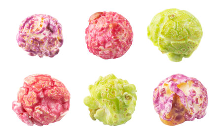 Colored fruity popcorn isolated on white background.の写真素材