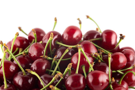 Red cherries, juicy fruits with a vibrant red hue. Bursting with sweet flavor.の写真素材