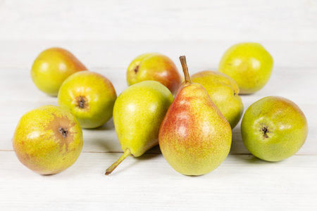 Fresh pears on wooden background. Selective focus.の写真素材