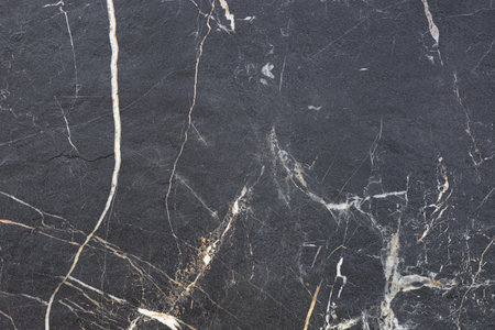 black marble background. black marble wallpaper and counter tops. black marble floor and wall tile. black travertino marble texture. natural granite stone.の写真素材
