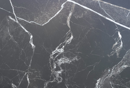 Fragment of stone texture with scratches and cracks. Natural Background, New marble.の写真素材